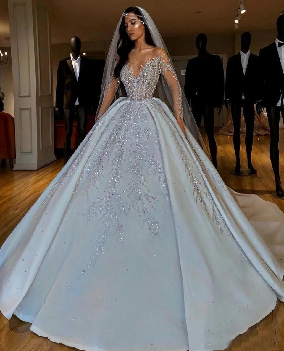 

Dubai Arabic Ball Wedding Dresses Plus Size Sweetheart Backless Sweep Train Bridal Gowns Bling Luxury Beading Sequins Wed