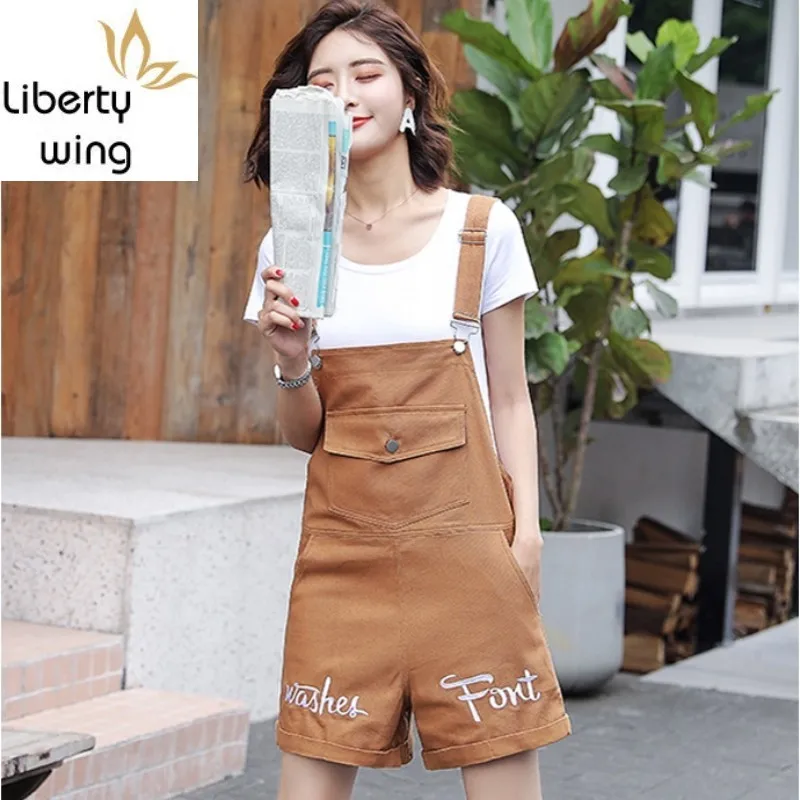 Женский джинсовый комбинезон повседневный однотонный короткий с большими