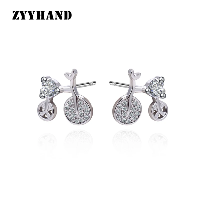 

Женские серьги-гвоздики серебристого цвета с платиновым покрытием и цирконом