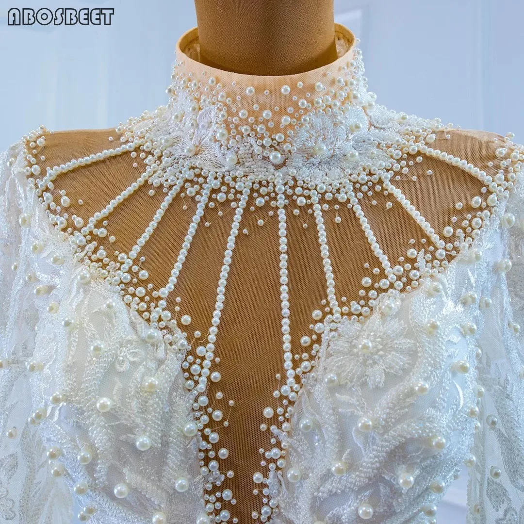 

Long Sleeve Lace Mermaid Wedding Dress with Long Train Luxury Beads Wedding Gown for Bridal 2021 Open Back and Lace Up High Neck