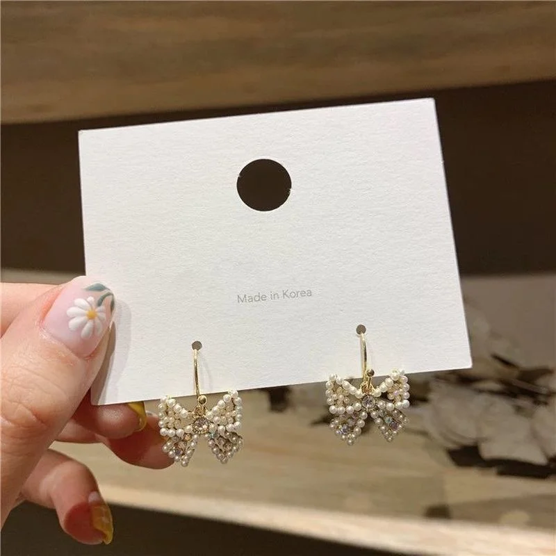 

Personality joker bowknot earrings small earrings 2020 new tide ins senior girl earrings