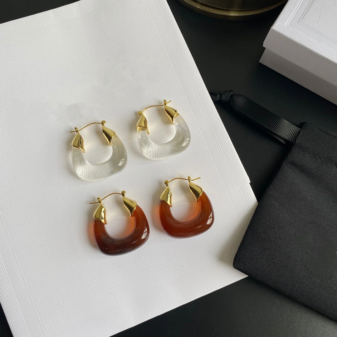 

White brown pendant earrings, suitable for any season, with coat dress