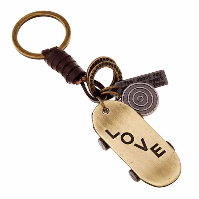 

Alloy bronze trend street scooter retro woven cowhide car shape key chain plastic snow Vista accessories carry backpack pendant
