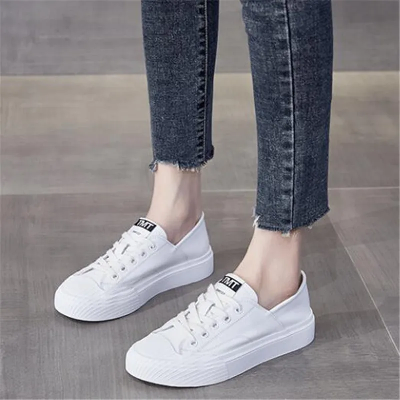 Женские кроссовки из натуральной кожи на шнуровке белые вулканизированной