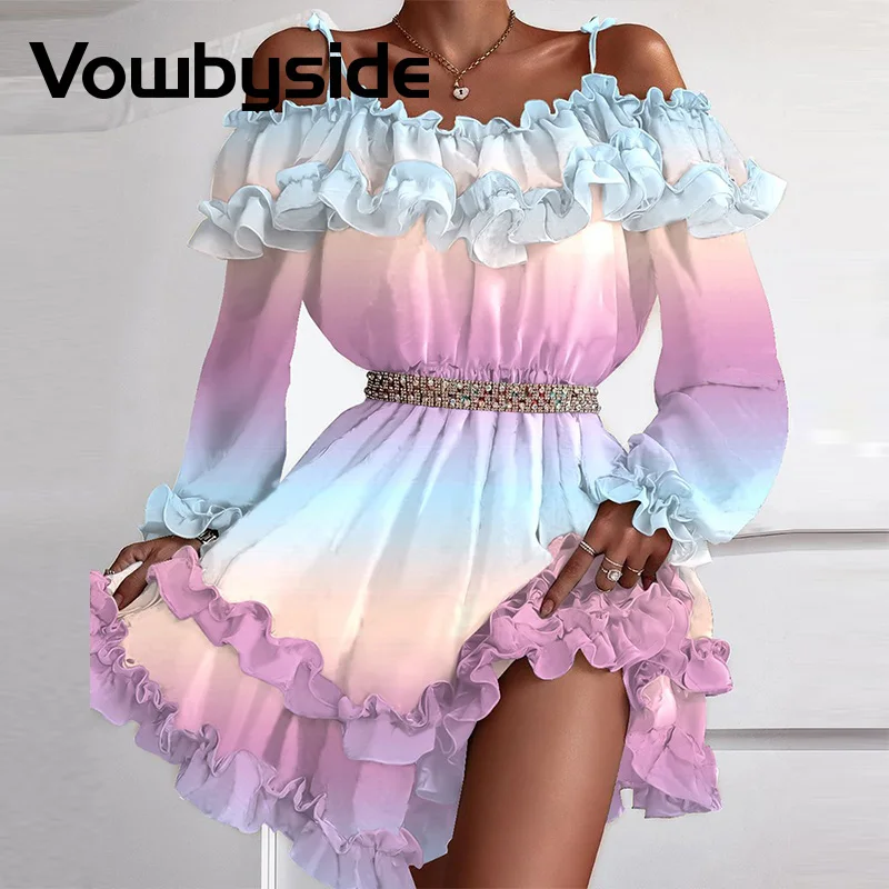 

Платье с открытыми плечами и оборками на Подоле с разноцветным принтом