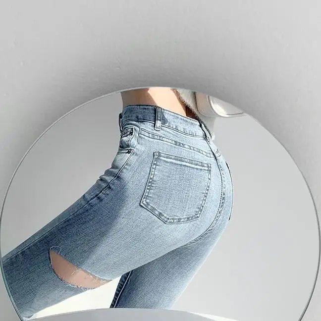 

Net red jeans with holes women's slim buttocks slim Leggings spring 2021 new pencil pants trend