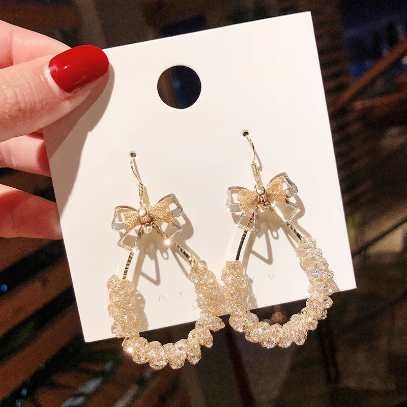 

2021 New Design Temperament Pearl Hollow Dangle Earrings Crystal Bow Boho Woman Earring Wholesale Jewellery for Women