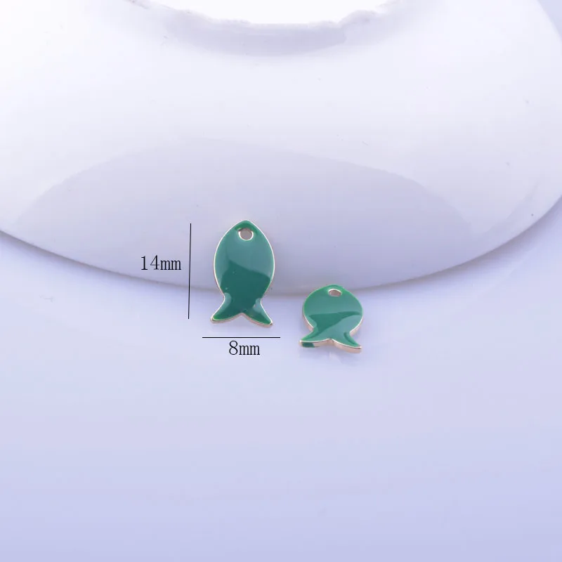 Двухсторонние эмалевые подвески в виде рыб золотого цвета 30 шт. 8*14 мм медные