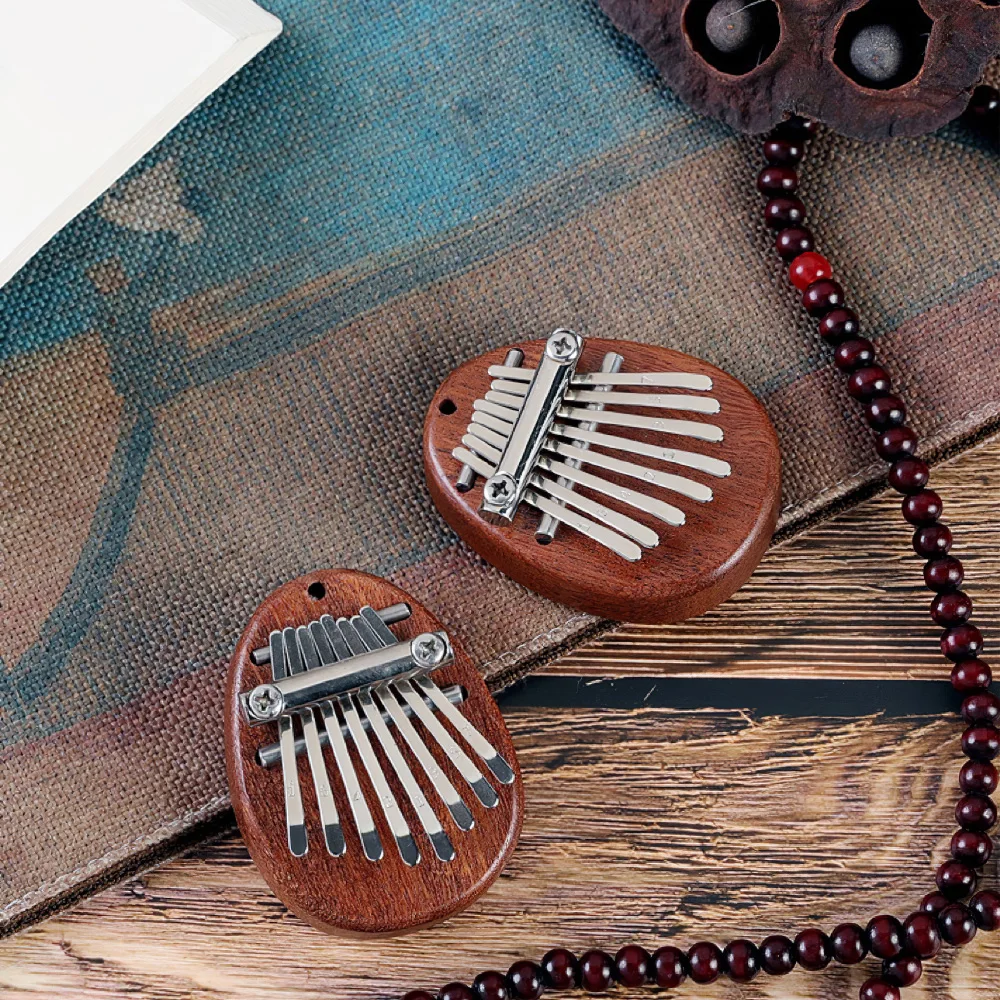 Детский развивающий мини-пианино Kalimba на 8 клавиш портативный музыкальный