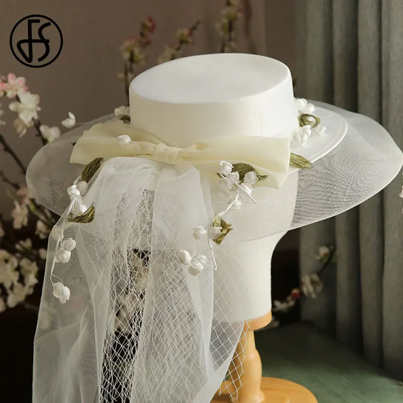 

FS Fashion Wide Brim Flat Satin Fedora Hat Women Flower Gauze Bow Mesh Sombrero Cap Bride Wedding Winter Sun Fascinator Hat 2021