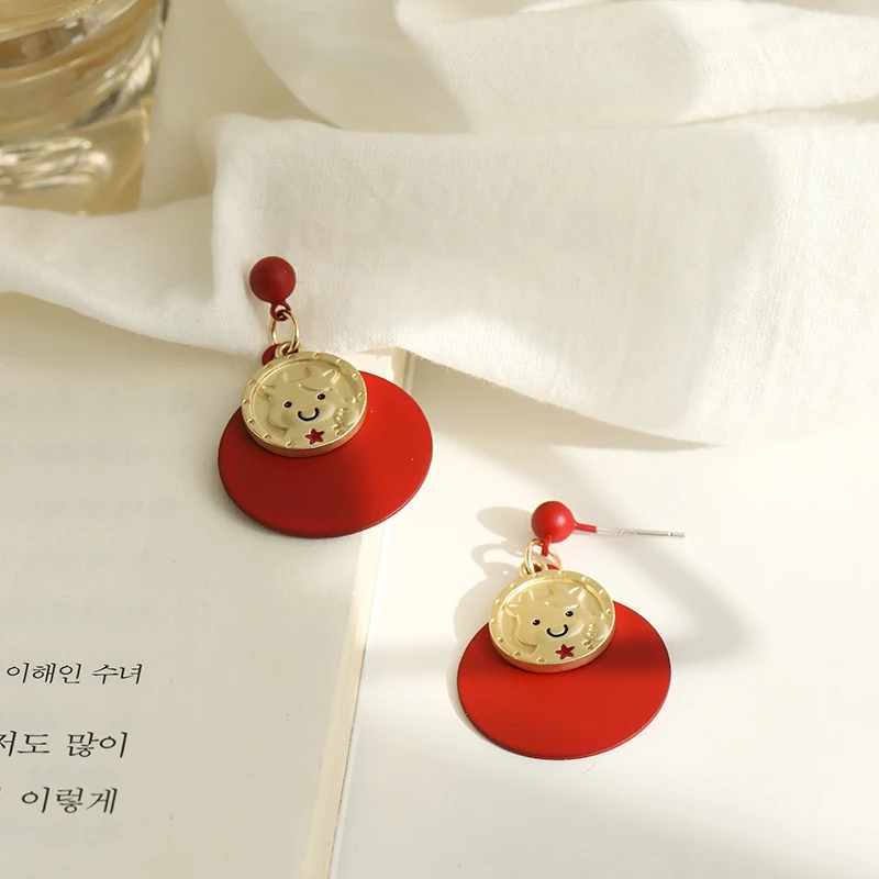 

Stud earrings female show face small New Year fortune 2021 new earrings ACTS the role of niche senior tassel long design feeling