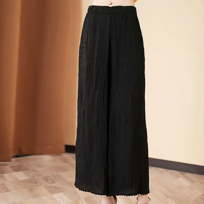 

Женские летние свободные брюки размера плюс, эластичные плиссированные однотонные брюки миаке с эластичным поясом, модные повседневные Ас...