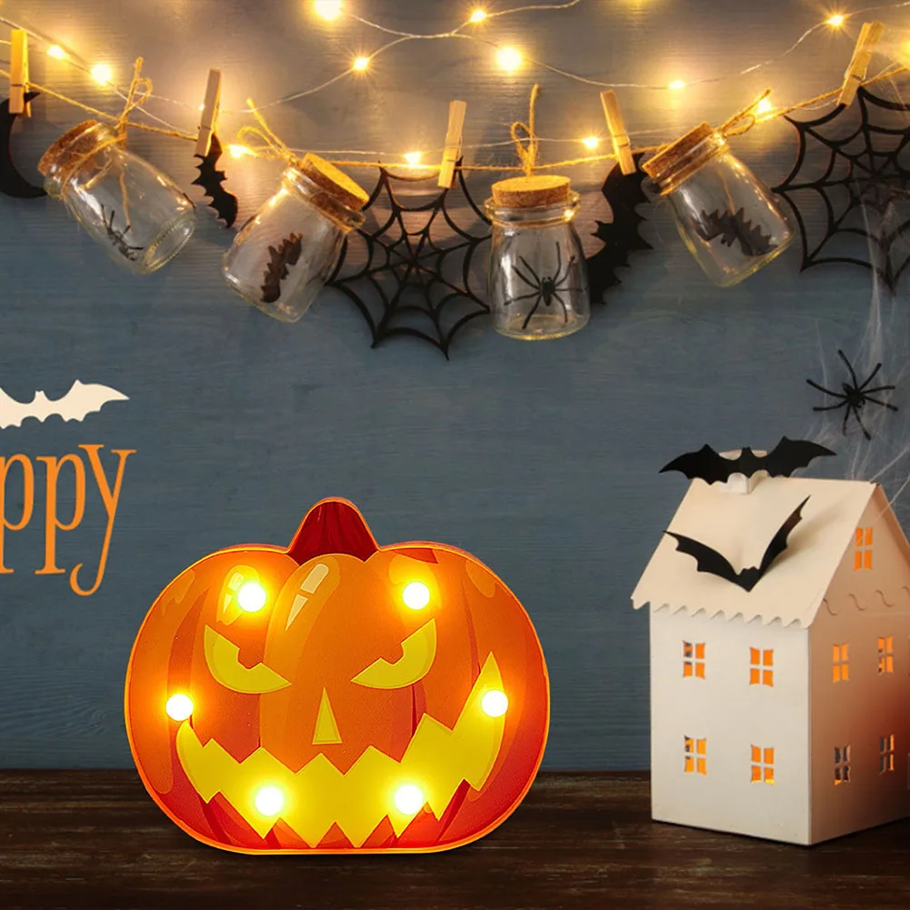 

Светодиодный ночсветильник в виде тыквы, пластиковая настольная декоративная лампа для Хэллоуина, настольное украшение, на батарейках, теп...