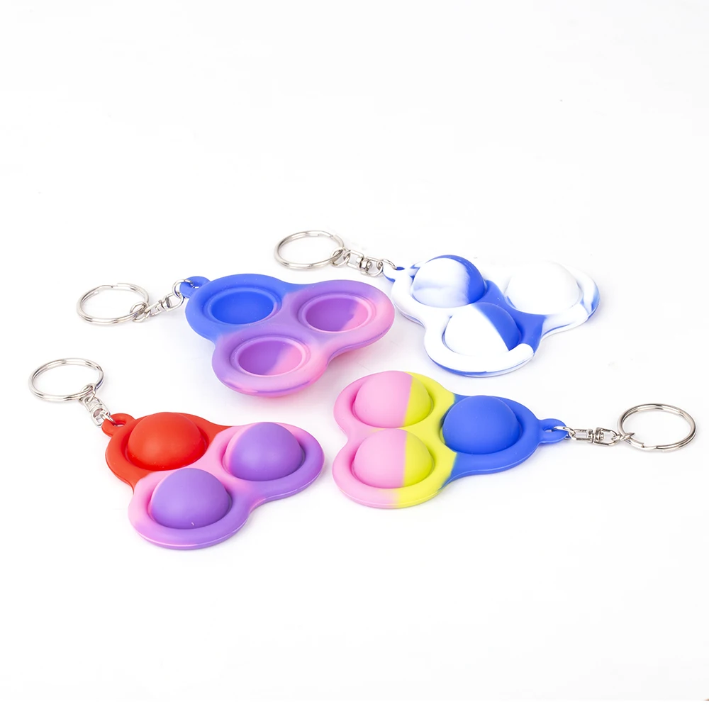 

Hot Sale Unique New Design Colorful Silicone Stress Relief Hand Toys Simple Dimple Keychain Mini Fidget Toy for Kids and Adults