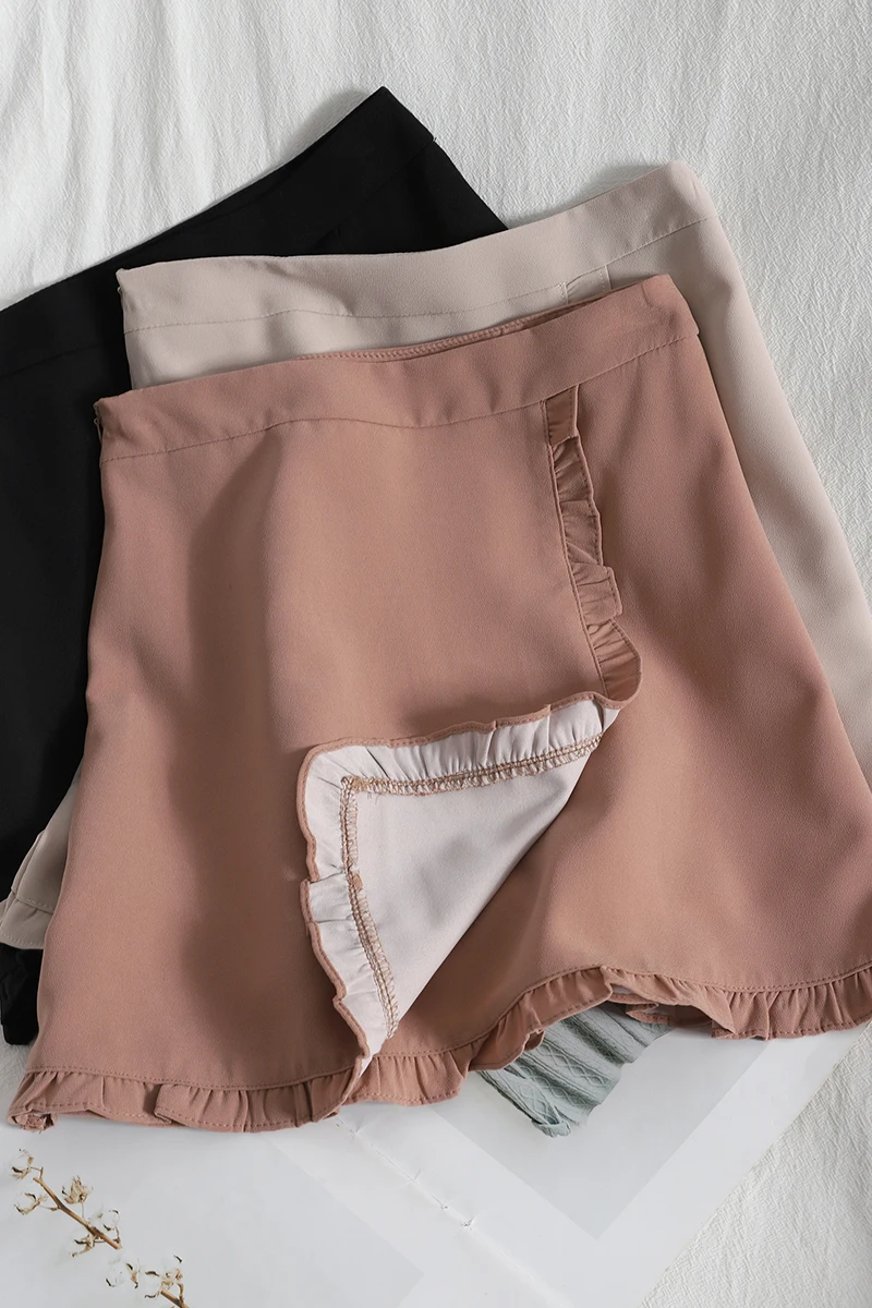 

Korean vintage irregular ruffled student short skirt spring high waist bag hip skirt for womens casual solid color A-line skirt
