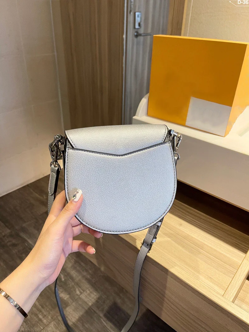 

100935 34 2021New lady classic color saddle bag handbag sidebag