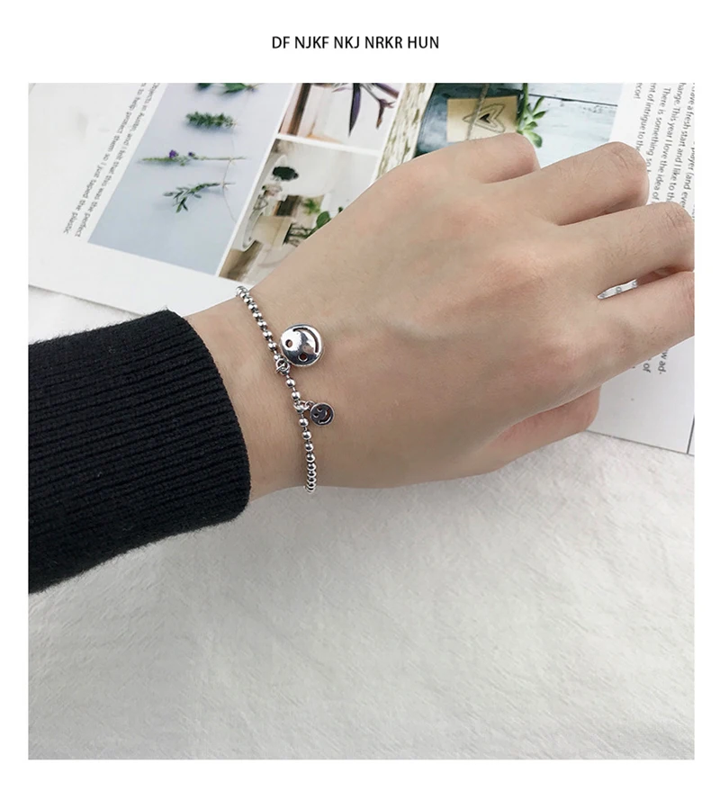 

Женский браслет со смайликом из серебра 925 пробы