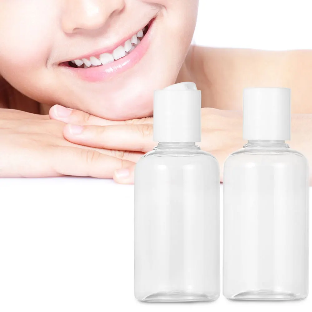 

12pcs 75ml Refillable Bottle Press Cap Travel Bottle Storage Container for Shampoo Cream Lotion (Random Cap Color)