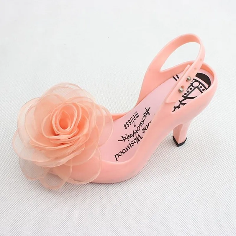 Женские туфли-лодочки на высоком каблуке с открытым носком украшенные шелковыми