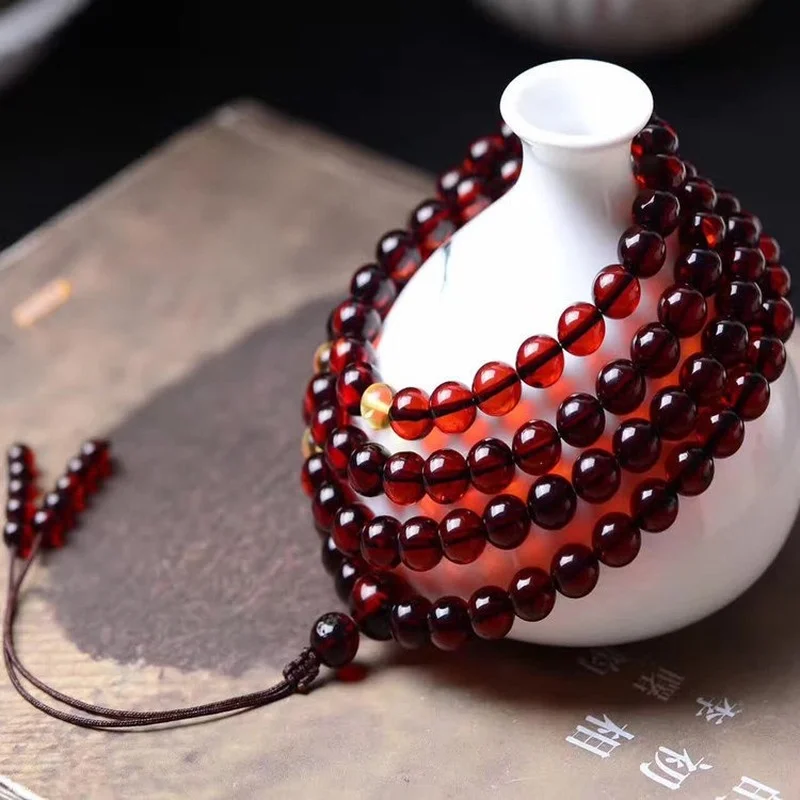 

Браслет из Мьянмы с натуральными бусинами амбе 108 Будды ожерелье из необработанного янтарного Камня Мужские Женские браслеты винный красны...