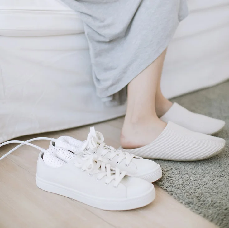 

Student warm shoes dehumidification deodorization sterilization quick drying timing warm shoes dryer