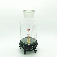 laboratory aspirator bottle 5000mlwide mouthclear with tick markswith metal valve stopper and base