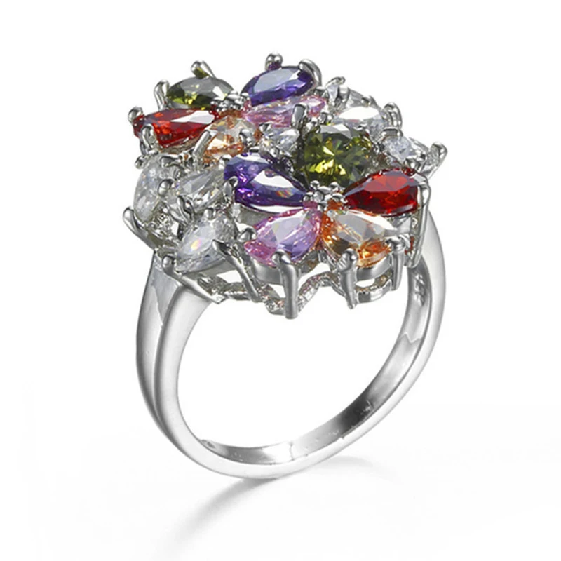 

Ofertas Classic Flower Ring Temperament Creative Color Ladies Crystal Jewelry Whole Sale Couple Wedding Rings Womens