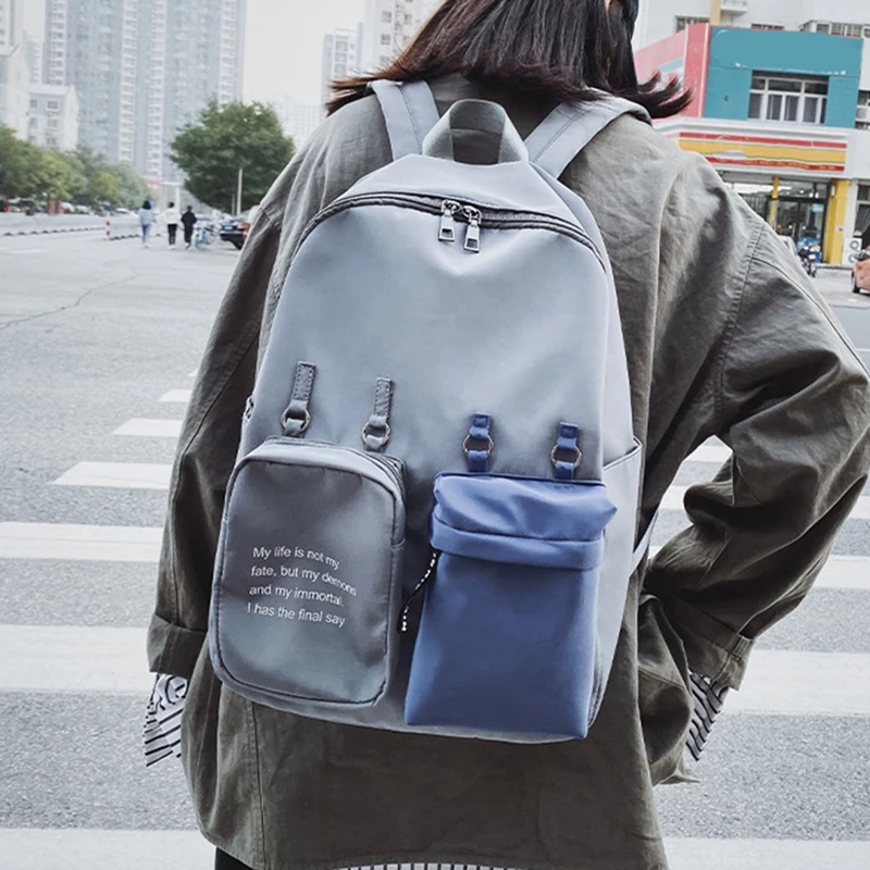 

Contrasting Color Backpack Men and Women School Bag Travel Bag Youth Backpack
