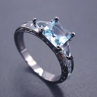 trendy womens black gold plated ring cubic zirconia blue stone