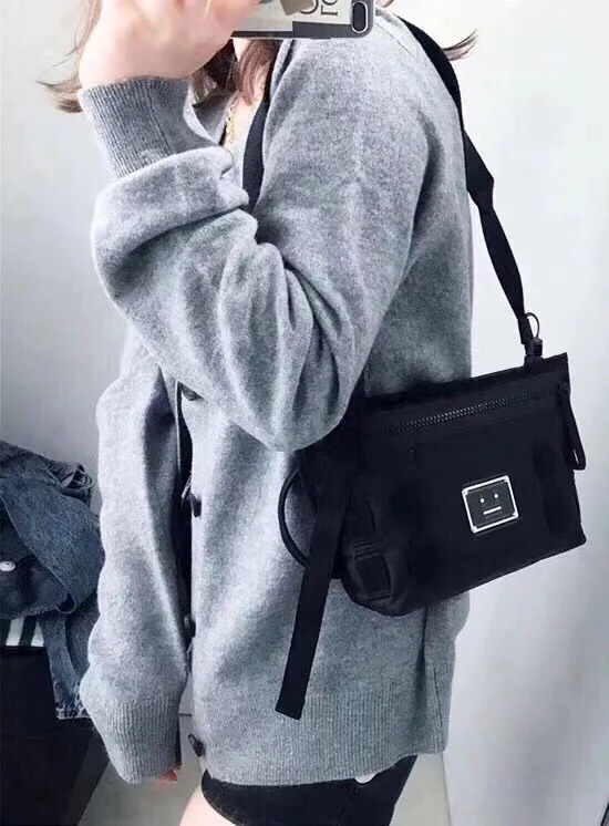 

2021 new single shoulder bag metal name plate dumpling cross bag men's and women's single shoulder bag tide bag mobile phone bag