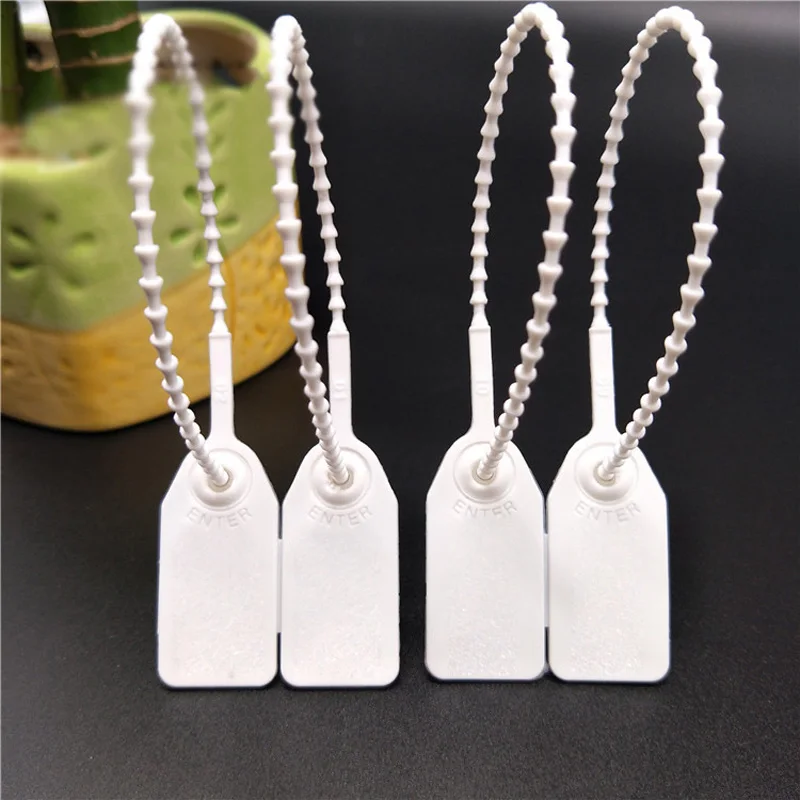 Пластиковые бирки пронумерованные стяжки безопасные анти тамперные уплотнения