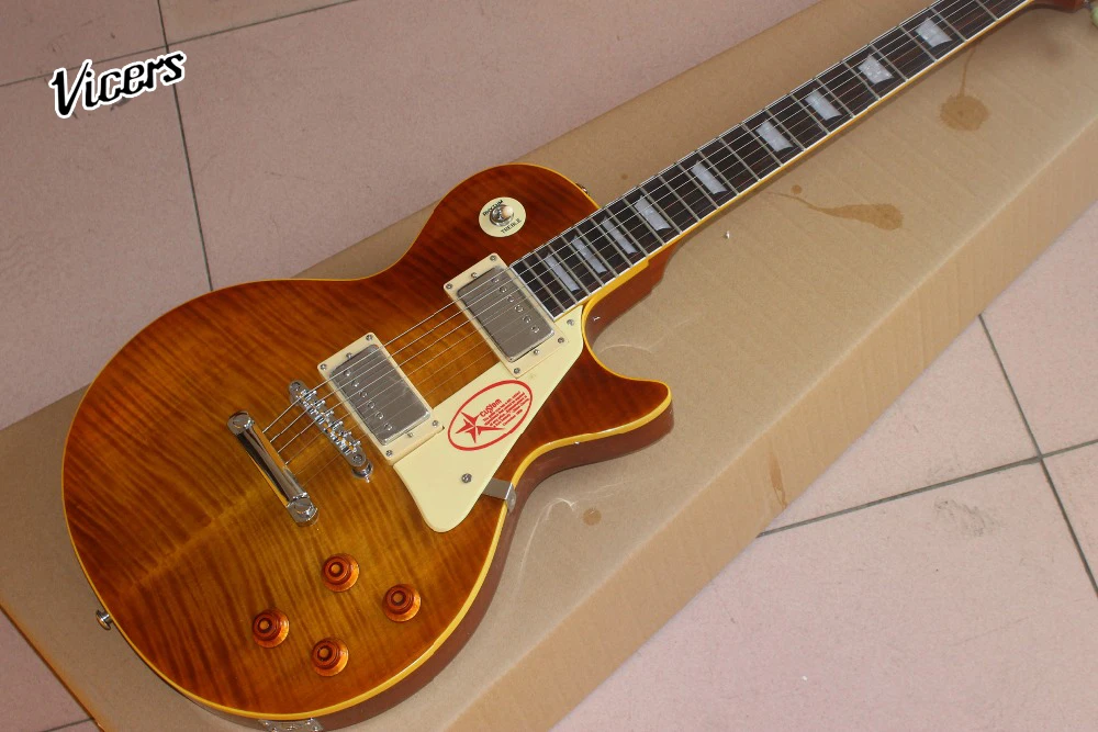 

Custom Shop.Standard Electric guitar.Rosewood fingerboard.Chrome hardware guitaar.tiger flame maple top