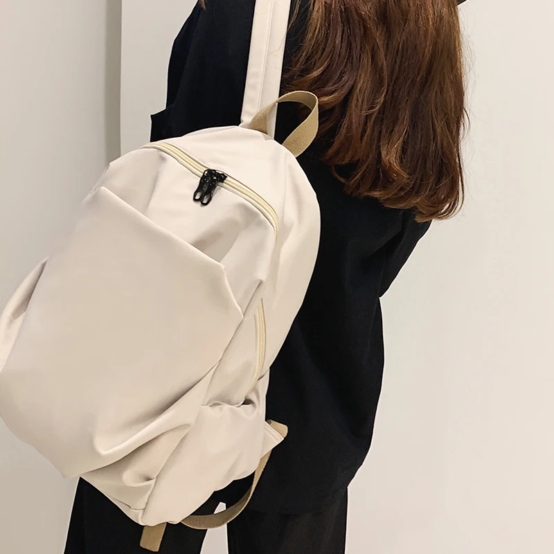 

School bag female college students pure color simple wild backpack high school students Korean Harajuku ulzzang backpack
