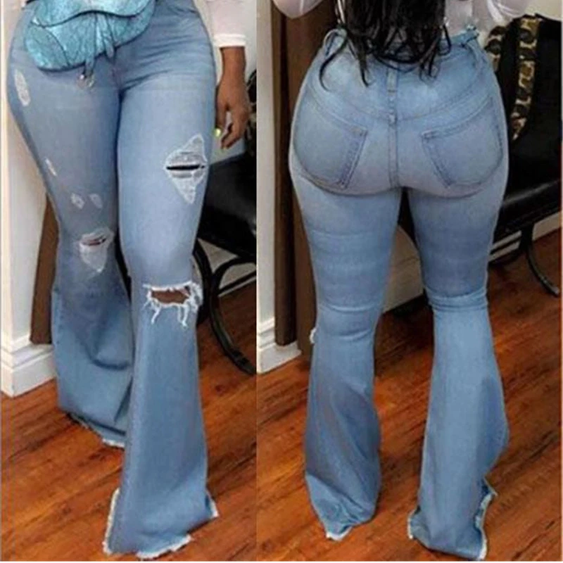 Женские расклешенные джинсы с высокой талией черные рваные расклешенным низом