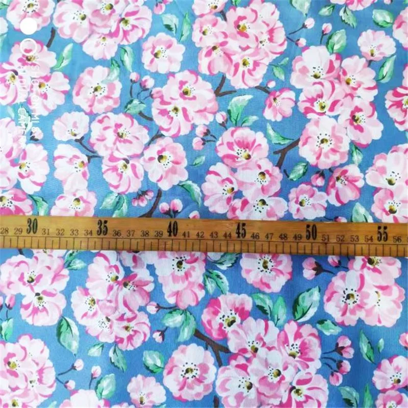 

130cm wide foreign trade denim on grey ground with dense pink flowers