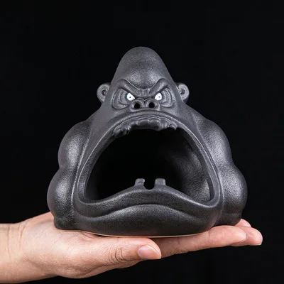 

Tao fan cute cartoon small animal ashtray orangutan anti-fly ash ceramic household living room trend car big ashtray
