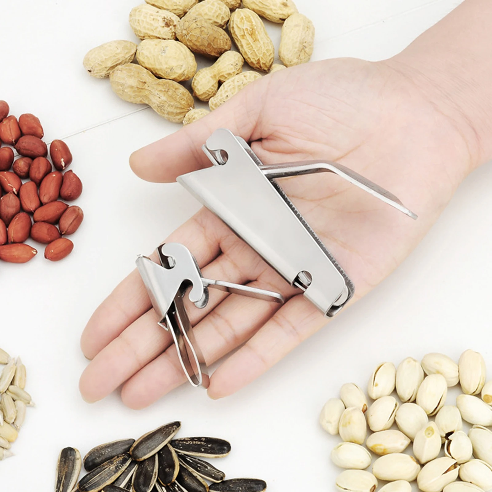 

Stainless Steel Peeling Melon Seeds Artifact Pine Nut Nut Opening Device Household Grilled Peanuts Watermelon Peeling Device