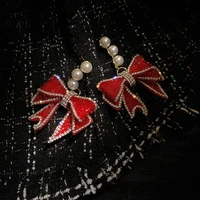 925 silver needle korea east gate fashion exaggerated freshwater pearl red diamond studded bow earrings