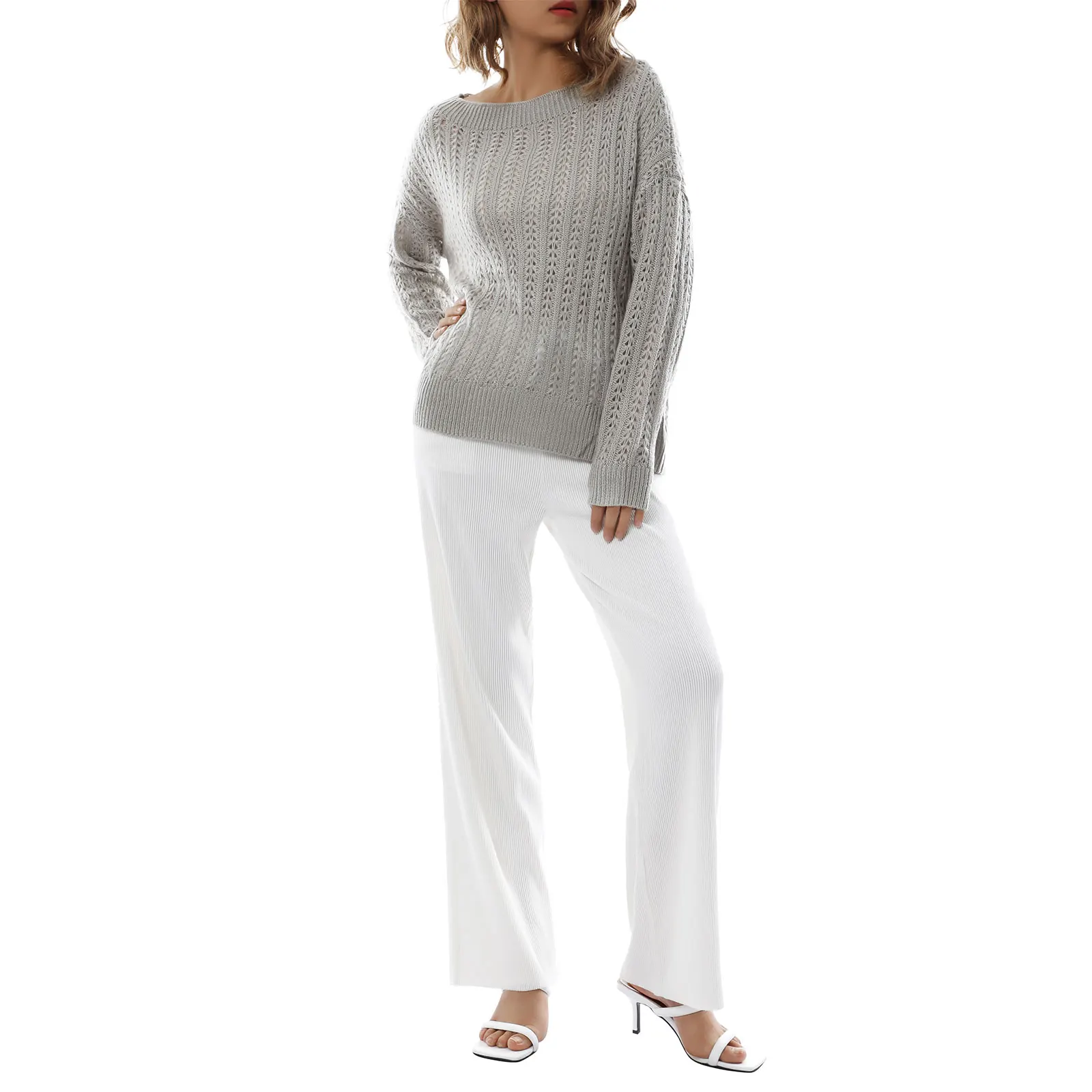 

Women’s Casual Long Sleeve Loose Sweater Fashion Solid Color Round Neck Hollow Knitwear