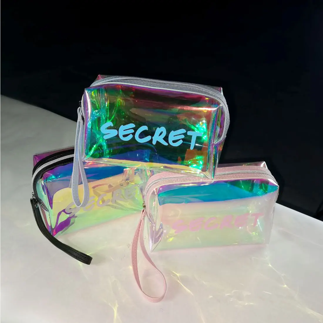 

Hot Sale Laser Deisgn Transparent Travel Bag Female Waterproof Jelly Bag PVC Cosmetic Bag For Female Makeup Bag