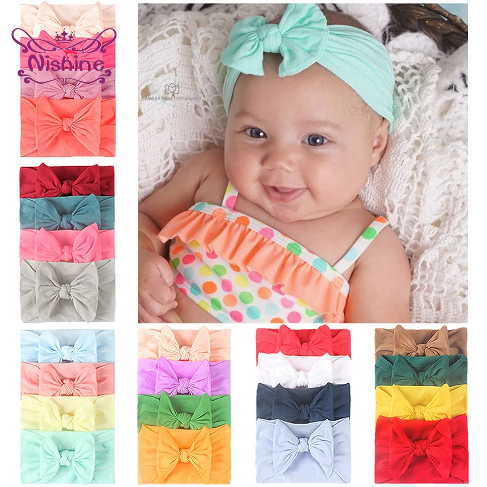 

Nishine 4pcs/lot Fashion Handmade Knotted Elastic Infant Hairband Solid Color Bowknot Nylon Headband Bows Headwear Photo Props