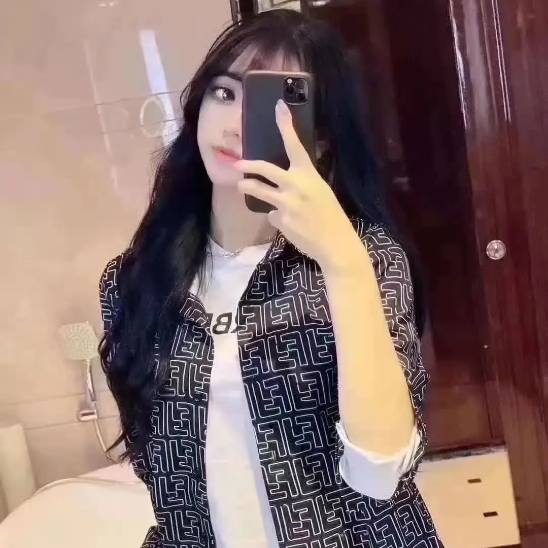 

Spring and summer new fashion shirt net red same printed silk face silky loose men's and women's shirt