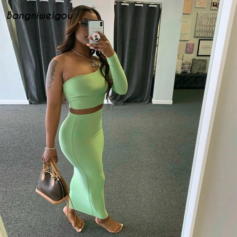 

Женский костюм-двойка с коротким топом и юбкой-карандаш с одним рукавом, однотонный зеленый костюм на весну и осень подходящий Топ