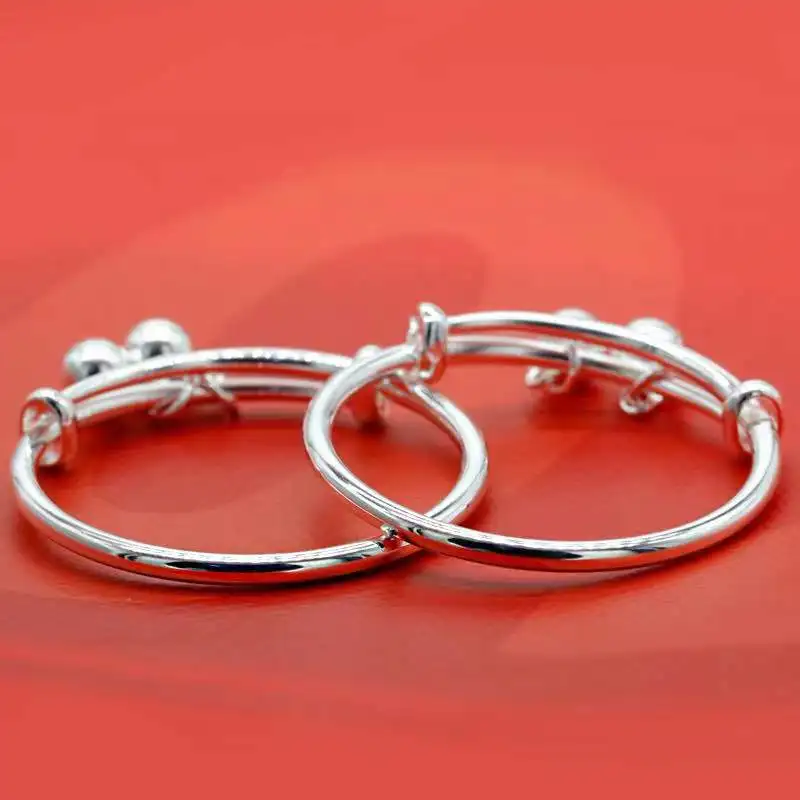 Браслет из серебра 9999 пробы с колокольчиком и надписью Благословение ребенка |