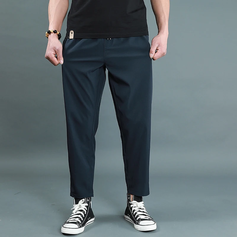 

Men Spring Casual Fashion Quick Dry Breathable Solid Stretch Pants Male Summer Lightweight Street Fitness Joggers Long Trousers