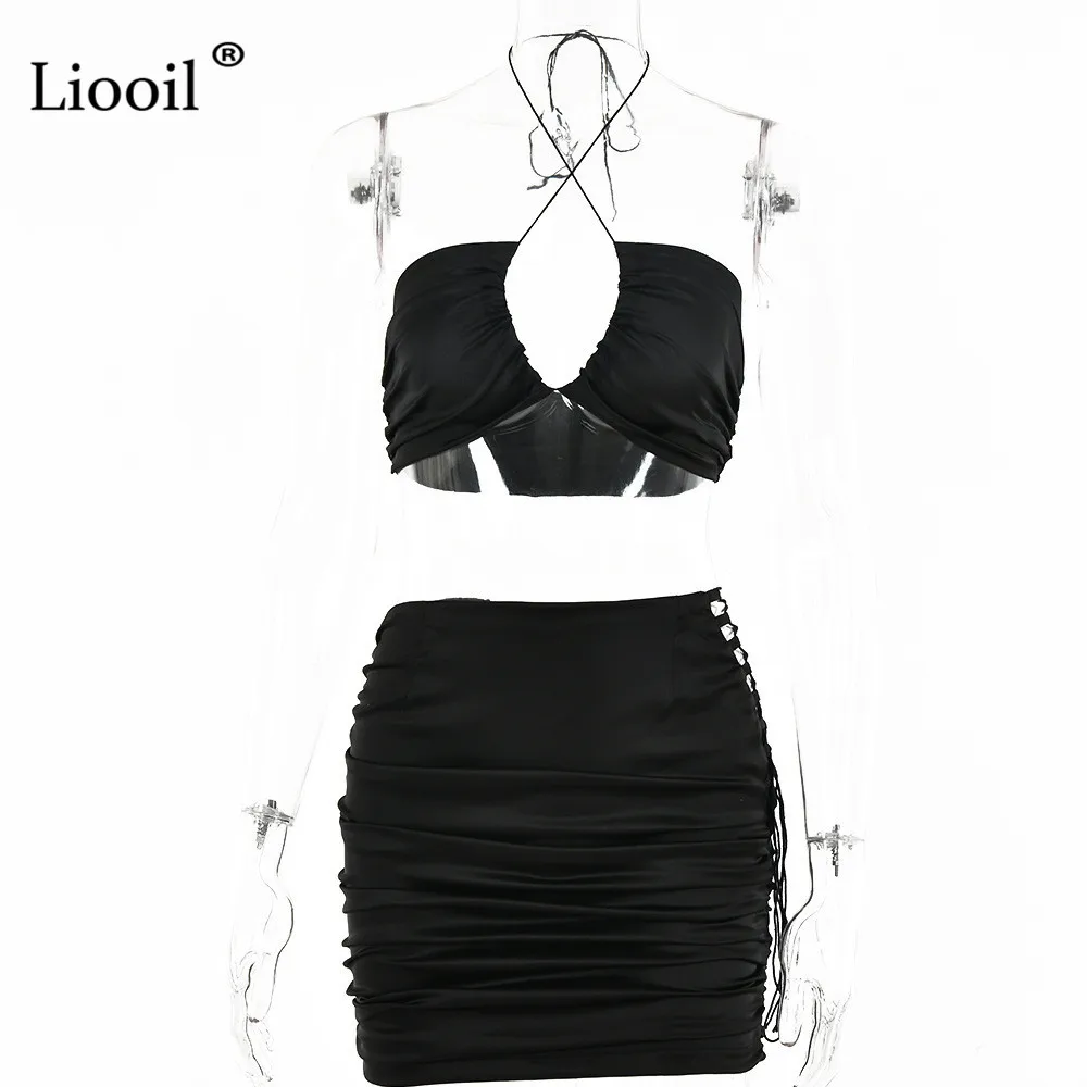 

Liooil Bodycon Two Piece Set Women Halter Top and Mini Skirts Sleeveless Backless Hollow Out Bandage Skirt Set 2021 Sexy Outfit