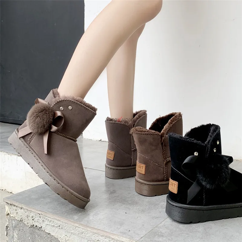 

Winter women snow boots cotton shoes Hairball short tube winter boots women warm Plus velvet Solid color women ankle boots