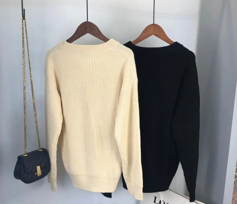

2020 Autumn and Winter Arc de Triomphe Butter Wool Sweater Creamy Yellow Round Neck Knitted women's fashion Top