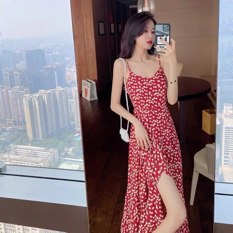 

French red floral sling dress temperament tea break dress spring and summer 2021 V-neck fashion new wild holiday beach dress