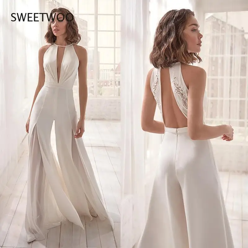 

2021 European and American New Women's Sleeveless Sexy Deep V Hanging Neck Jumpsuit Casual All-Match Commuter Trousers